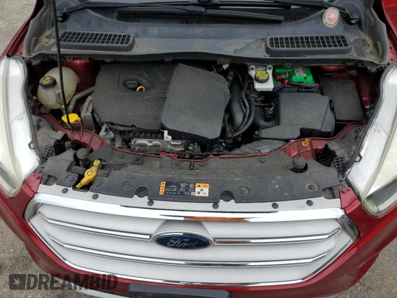 2018 Ford Escape SE z VIN 1FMCU9GD7JUB01668, wystawiony jako Copart lot #57038675 z przebiegiem 70 780 mil mil oraz Szkoda całkowita • Salvage title. Historia ofert i sprzedaży dostępna na DreamBid. Obrazek 12.