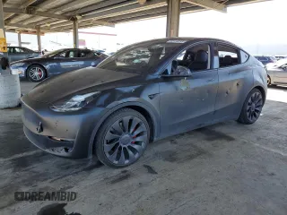 2024 Tesla Model Y Performance z VIN 7SAYGDEFXRF037934, wystawiony jako Copart lot #52126255 z przebiegiem 27 366 mil mil oraz Szkoda całkowita • Salvage title. Historia ofert i sprzedaży dostępna na DreamBid. Obrazek 1.