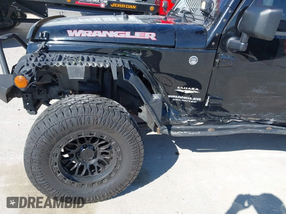 2013 Jeep Wrangler Unlimited Sahara with VIN 1C4BJWEG3DL617511, listed as a IAAI auction lot 41842979 with 149,980 mi miles and . Bid and sale history available at DreamBid. Image 6.