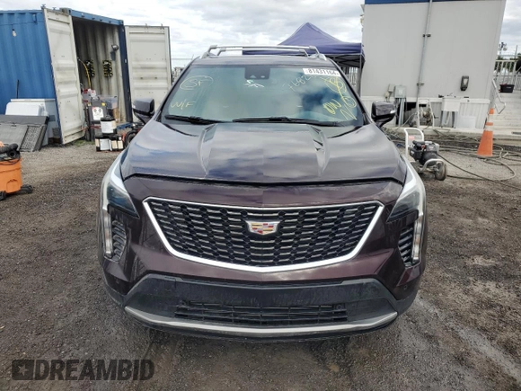 2021 Cadillac XT4 FWD Premium Luxury z VIN 1GYFZCR45MF080027, wystawiony jako Copart lot #46195835 z przebiegiem Nie podano mil oraz Nie do naprawy • Non repairable. Historia ofert i sprzedaży dostępna na DreamBid. Obrazek 5.