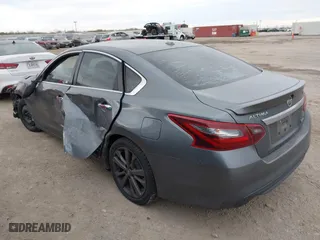 2018 Nissan Altima 2.5 SV with VIN 1N4AL3AP9JC256152, listed as a IAAI auction lot 41359670 with 136,686 mi miles. Bid and sale history available at carsss.com. Image 3.