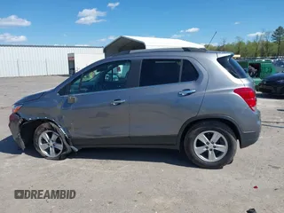 2020 Chevrolet Trax LT with VIN 3GNCJLSBXLL322296, listed as a IAAI auction lot 42030809 with 51,367 mi miles and . Bid and sale history available at DreamBid. Image 14.