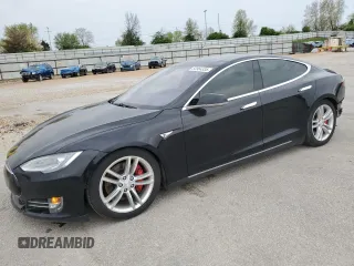 2015 Tesla Model S 85D with VIN 5YJSA1H42FF089907, listed as a Copart auction lot 53964335 with 70,386 mi miles and Salvage Title. Bid and sale history available at carsss.com. Image 1.
