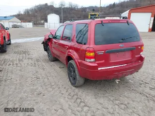 2006 Ford Escape Limited with VIN 1FMYU94116KD17566, listed as a IAAI auction lot 41538273 with 143,237 mi miles. Bid and sale history available at carsss.com. Image 3.