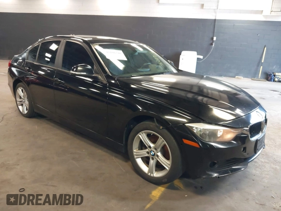 2014 BMW 3 Series 328i xDrive with VIN WBA3B3G50ENR83599, listed as a IAAI auction lot 42106340 with 195,309 mi miles. Bid and sale history available at carsss.com. Image 1.