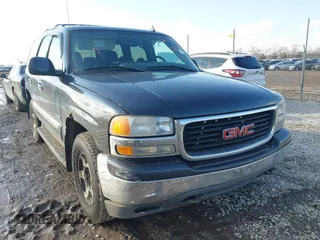 2006 GMC Yukon SLT with VIN 1GKEK13ZX6J128317, listed as a IAAI auction lot 41589308 with 292,654 mi miles. Bid and sale history available at carsss.com. Image 1.
