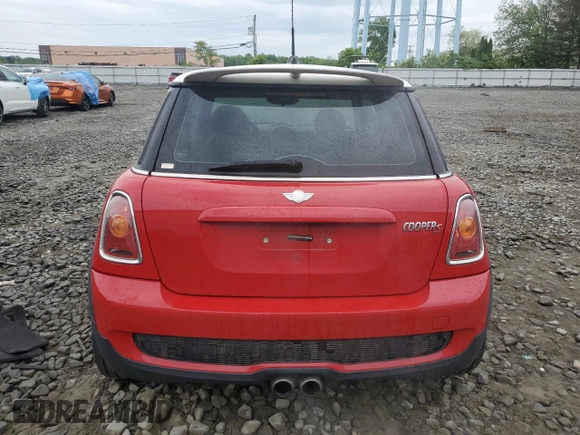 2007 MINI Hardtop S with VIN WMWMF73507TL86439, listed as a Copart auction lot 56500525 with 153,944 mi miles and Salvage title. Bid and sale history available at DreamBid. Image 6.