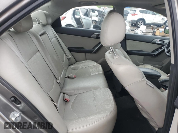 2010 Kia Forte EX z VIN KNAFU4A2XA5250756, wystawiony jako Copart lot #58743405 z przebiegiem 204 266 mil mil oraz Szkoda całkowita • Salvage title. Historia ofert i sprzedaży dostępna na DreamBid. Obrazek 10.