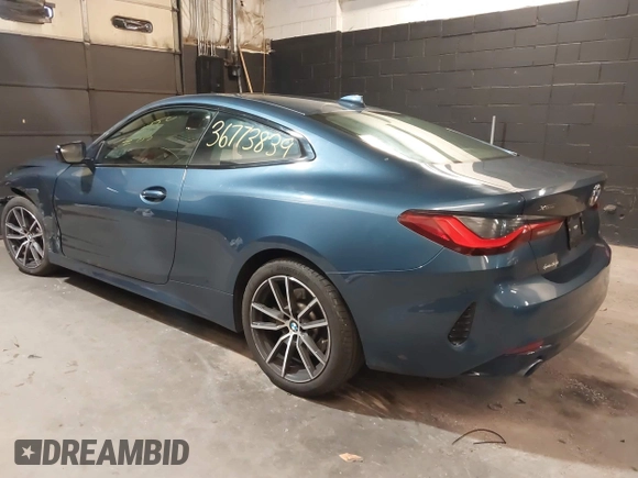2022 BMW 4 Series 430i xDrive with VIN WBA73AP05NCJ87742, listed as a IAAI auction lot 36773839 with 20,814 mi miles and . Bid and sale history available at DreamBid. Image 3.