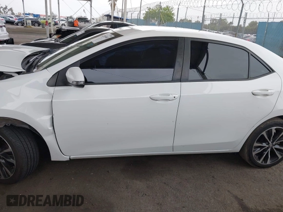2019 Toyota Corolla L with VIN 5YFBURHE7KP862111, listed as a IAAI auction lot 42205368 with 96,823 mi miles and . Bid and sale history available at DreamBid. Image 15.