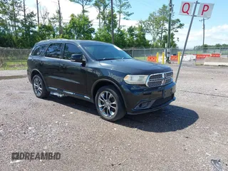 2014 Dodge Durango Citadel z VIN 1C4RDJEG5EC598485, wystawiony jako IAAI lot #42803773 z przebiegiem 90 147 mil mil oraz . Historia ofert i sprzedaży dostępna na DreamBid. Obrazek 1.