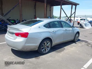 2017 Chevrolet Impala LT with VIN 2G1105S31H9197165, listed as a IAAI auction lot 42303730 with 232,046 mi miles and . Bid and sale history available at DreamBid. Image 4.