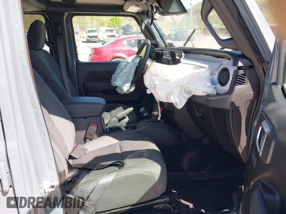 2024 Jeep Wrangler Sport S with VIN 1C4PJXDN2RW351741, listed as a IAAI auction lot 42122651 with 4,241 mi miles and . Bid and sale history available at DreamBid. Image 5.