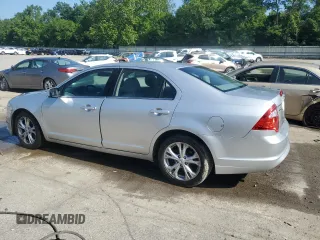 2012 Ford Fusion SE with VIN 3FAHP0HGXCR331498, listed as a Copart auction lot 61859325 with 61,445 mi miles and Salvage title. Bid and sale history available at DreamBid. Image 2.