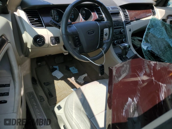 2011 Ford Taurus Limited with VIN 1FAHP2FW6BG157070, listed as a Copart auction lot 59300415 with 143,314 mi miles and Salvage title. Bid and sale history available at DreamBid. Image 8.