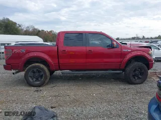 2013 Ford F-150 XL with VIN 1FTFW1CF4DFD68196, listed as a IAAI auction lot 41051752 with 164,149 mi miles. Bid and sale history available at carsss.com. Image 13.