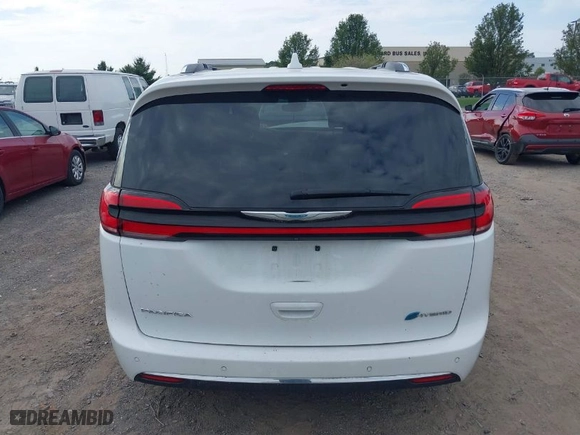 2021 Chrysler Pacifica Hybrid Touring L with VIN 2C4RC1L79MR597058, listed as a IAAI auction lot 40344372 with 80,566 mi miles. Bid and sale history available at carsss.com. Image 16.