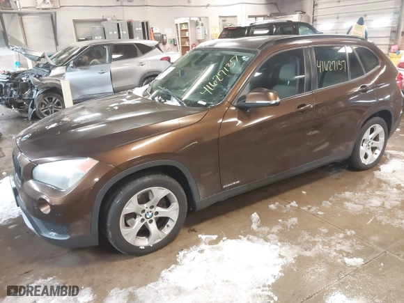 2013 BMW X1 28i with VIN WBAVM1C59DVW42455, listed as a IAAI auction lot 41627137 with 170,120 mi miles. Bid and sale history available at carsss.com. Image 2.