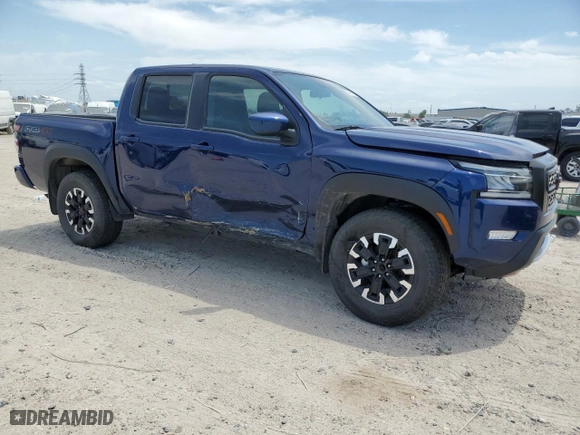 2023 Nissan Frontier PRO-4X with VIN 1N6ED1EK8PN672862, listed as a Copart auction lot 52718105 with 17,855 mi miles and Salvage Title. Bid and sale history available at carsss.com. Image 4.