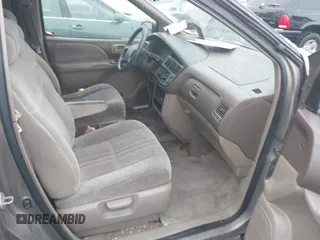 1999 Toyota Sienna LE with VIN 4T3ZF13C9XU164032, listed as a IAAI auction lot 41916673 with 296,628 mi miles and . Bid and sale history available at DreamBid. Image 5.
