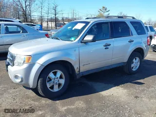 2008 Ford Escape XLT with VIN 1FMCU031X8KE76869, listed as a IAAI auction lot 41802935 with 155,746 mi miles. Bid and sale history available at carsss.com. Image 2.
