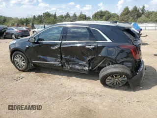 2020 Cadillac XT5 Premium Luxury AWD z VIN 1GYKNDRS4LZ142738, wystawiony jako Copart lot #61247675 z przebiegiem 60 353 mil mil oraz Szkoda całkowita • Salvage title. Historia ofert i sprzedaży dostępna na DreamBid. Obrazek 2.