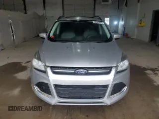 2014 Ford Escape SE z VIN 1FMCU9G97EUC43696, wystawiony jako Copart lot #57409665 z przebiegiem 68 586 mil mil oraz Czysty tytuł • Clean title. Historia ofert i sprzedaży dostępna na DreamBid. Obrazek 5.