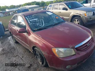 2005 Kia Spectra LX z VIN KNAFE121255152957, wystawiony jako IAAI lot #42055717 z przebiegiem 197 169 mil mil oraz . Historia ofert i sprzedaży dostępna na DreamBid. Obrazek 1.