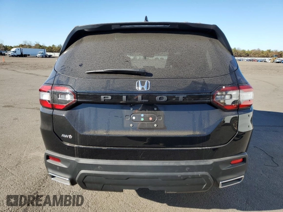 2023 Honda Pilot EX-L 7 Passenger with VIN 5FNYG1H52PB013462, listed as a Copart auction lot 79597574 with 25,302 mi miles and Salvage Title. Bid and sale history available at carsss.com. Image 6.