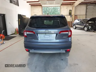 2021 Honda Pilot Touring 8-Passenger with VIN 5FNYF6H95MB048527, listed as a IAAI auction lot 42542138 with 40,584 mi miles and . Bid and sale history available at DreamBid. Image 16.