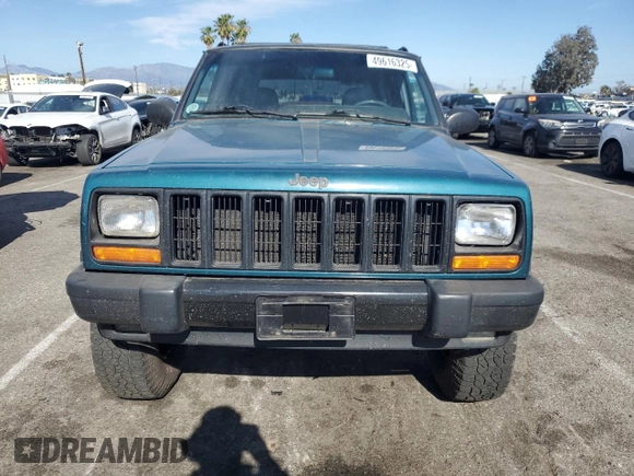 1997 Jeep Cherokee Sport with VIN 1J4FT68S4VL545385, listed as a Copart auction lot 49616325 with 239,798 mi miles and Salvage Title. Bid and sale history available at carsss.com. Image 5.
