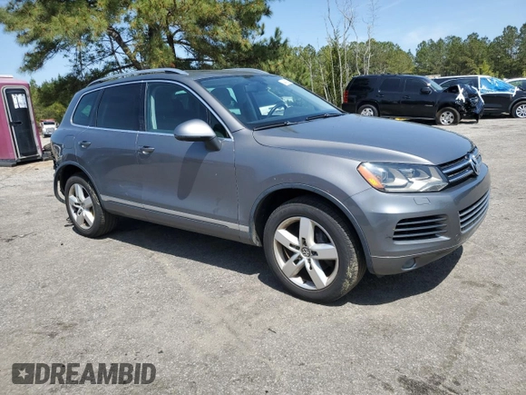 2012 Volkswagen Touareg Sport with VIN WVGEF9BP0CD010197, listed as a Copart auction lot 48480355 with 131,605 mi miles and Salvage Title. Bid and sale history available at DreamBid. Image 4.