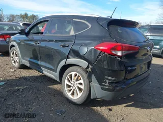 2016 Hyundai Tucson SE with VIN KM8J3CA45GU051376, listed as a IAAI auction lot 41251762 with 169,354 mi miles. Bid and sale history available at carsss.com. Image 3.