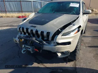 2015 Jeep Cherokee Latitude with VIN 1C4PJMCS4FW578401, listed as a IAAI auction lot 41014082 with 127,465 mi miles. Bid and sale history available at carsss.com. Image 6.