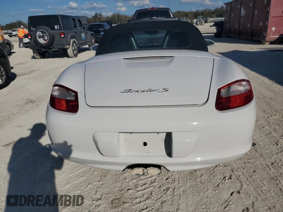 2007 Porsche Boxster S z VIN WP0CB29837U730970, wystawiony jako Copart lot #77829184 z przebiegiem Nie podano mil oraz Szkoda całkowita • Salvage title. Historia ofert i sprzedaży dostępna na DreamBid. Obrazek 6.