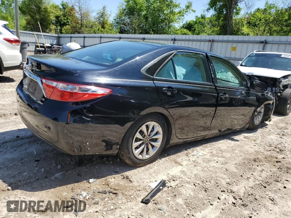 2017 Toyota Camry XLE z VIN 4T1BF1FK0HU700820, wystawiony jako Copart lot #52010655 z przebiegiem Nie podano mil oraz Szkoda całkowita • Salvage title. Historia ofert i sprzedaży dostępna na DreamBid. Obrazek 3.