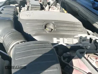 2012 Jeep Grand Cherokee Laredo z VIN 1C4RJEAT9CC307423, wystawiony jako IAAI lot #42803805 z przebiegiem 129 360 mil mil oraz . Historia ofert i sprzedaży dostępna na DreamBid. Obrazek 12.