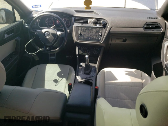 2019 Volkswagen Tiguan SE with VIN 3VV3B7AX4KM061848, listed as a Copart auction lot 49978745 with 100,295 mi miles and Salvage Title. Bid and sale history available at DreamBid. Image 8.