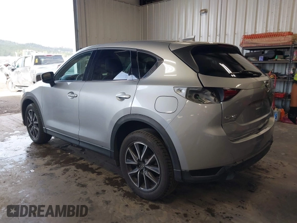 2018 Mazda CX-5 Grand Touring with VIN JM3KFBDM4J0350420, listed as a IAAI auction lot 41881566 with 96,515 mi miles. Bid and sale history available at carsss.com. Image 3.