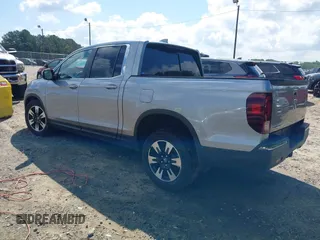 2020 Honda Ridgeline RTL with VIN 5FPYK3F5XLB025857, listed as a IAAI auction lot 42307343 with 97,262 mi miles and . Bid and sale history available at DreamBid. Image 3.