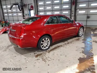 2009 Cadillac CTS AWD w/1SB with VIN 1G6DT57V190172738, listed as a IAAI auction lot 41310599 with 148,351 mi miles. Bid and sale history available at carsss.com. Image 4.
