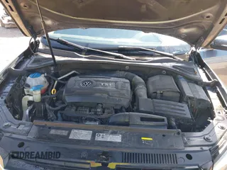 2015 Volkswagen Passat 1.8T Wolfsburg Ed with VIN 1VWAT7A3XFC115934, listed as a IAAI auction lot 41948035 with 243,143 mi miles. Bid and sale history available at carsss.com. Image 10.
