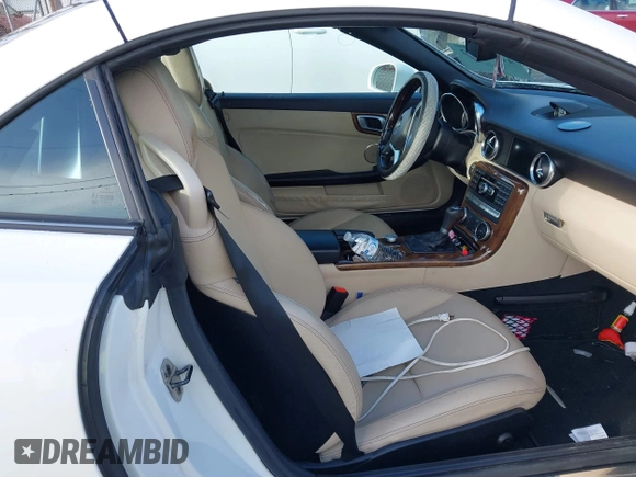 2014 Mercedes-Benz SLK 250 with VIN WDDPK4HA2EF085432, listed as a IAAI auction lot 41141812 with 65,718 mi miles and . Bid and sale history available at DreamBid. Image 5.