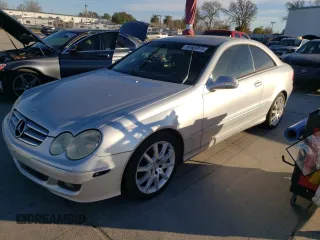 2007 Mercedes-Benz CLK-Class 3.5L with VIN WDBTJ56HX7F213614, listed as a Copart auction lot 88474915 with 198,352 mi miles and Salvage Title. Bid and sale history available at carsss.com. Image 1.