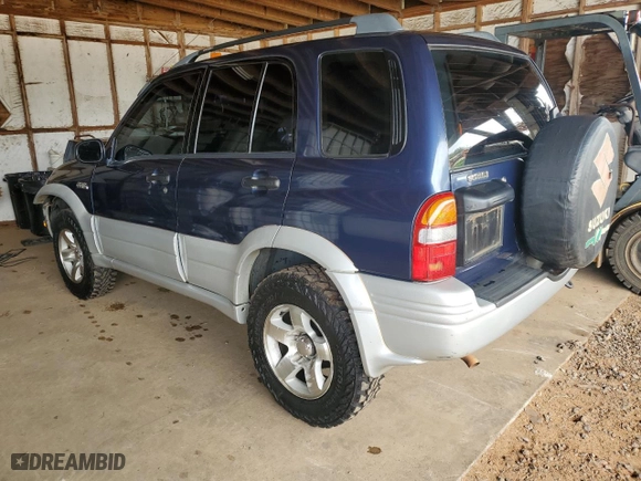 2000 Suzuki Grand Vitara JLX with VIN JS3TD62VXY4110167, listed as a Copart auction lot 77887674 with 126,214 mi miles and Salvage Title. Bid and sale history available at carsss.com. Image 2.