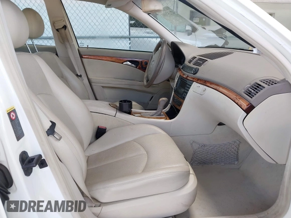 2003 Mercedes-Benz E 320 with VIN WDBUF65J43A241903, listed as a IAAI auction lot 42157490 with 122,773 mi miles and . Bid and sale history available at DreamBid. Image 5.