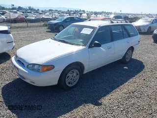 1997 Ford Escort LX с VIN 3FALP15P2VR102675, выставлен на аукционе IAAI как лот 42447246 с пробегом 153 642 миль миль и . История ставок и продаж доступна на DreamBid. Изображение 2.