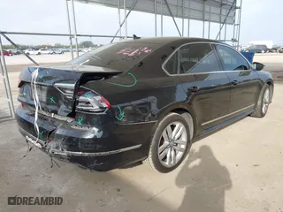 2017 Volkswagen Passat 1.8T SE w/Technology with VIN 1VWGT7A36HC074702, listed as a IAAI auction lot 41805024 with 124,857 mi miles. Bid and sale history available at carsss.com. Image 4.