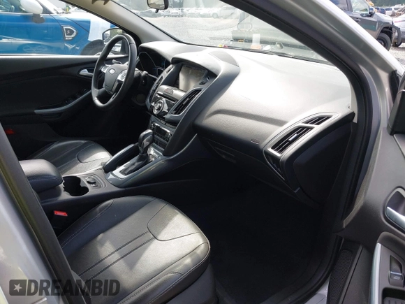 2014 Ford Focus Titanium with VIN 1FADP3N20EL160982, listed as a IAAI auction lot 42565322 with 112,551 mi miles and . Bid and sale history available at DreamBid. Image 5.