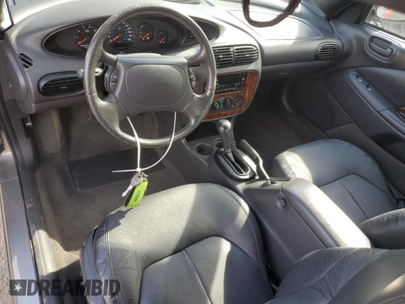 1998 Chrysler Sebring JXi z VIN 3C3EL55H7WT202665, wystawiony jako Copart lot #54619905 z przebiegiem 36 351 mil mil oraz Szkody całkowita. Historia ofert i sprzedaży dostępna na DreamBid. Obrazek 8.